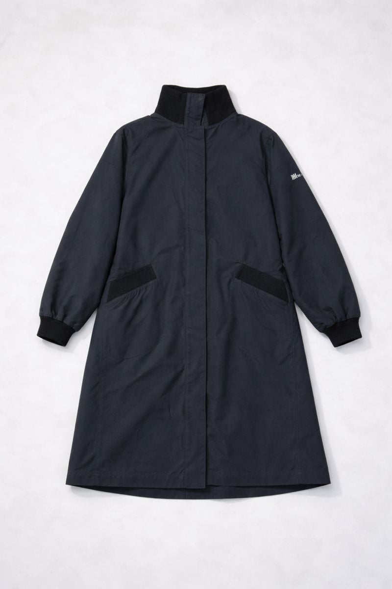 Dark gray knee-length coat with stand-up collar, hidden closure, and flapless pockets