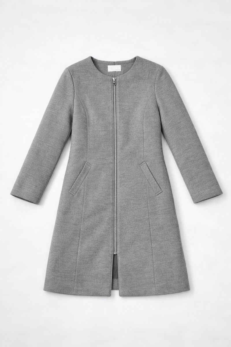Grey no-collar zip front coat with a clean minimalist design